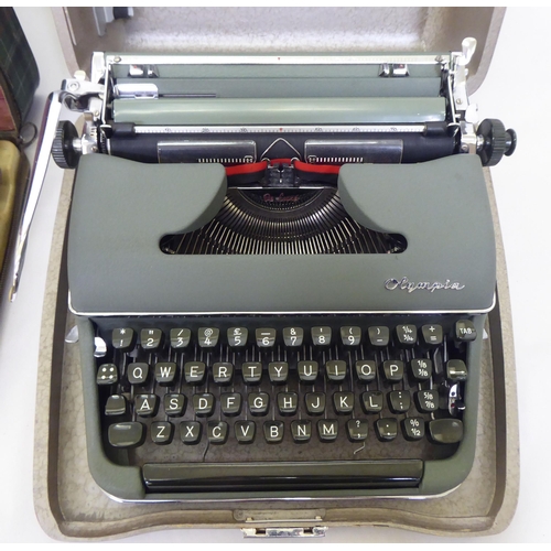 84 - Two vintage portable Olympia manual typewriters