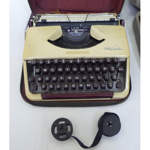 84 - Two vintage portable Olympia manual typewriters