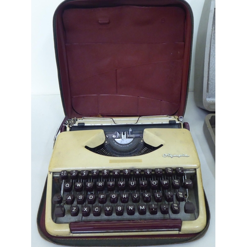 84 - Two vintage portable Olympia manual typewriters