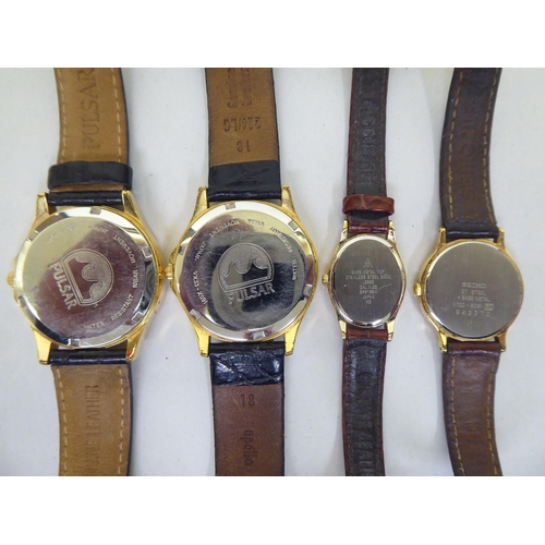 86 - Modern wristwatches; a Dunhill gas filled, red enamel and yellow metal cigarette lighter; and a Dunh... 