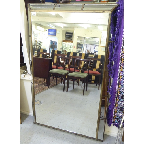 206 - A modern Italianate inspired gilt framed mirror with multiple, angled slip panels  47