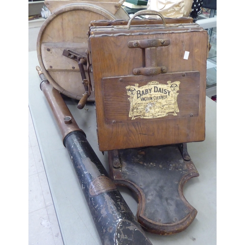 40 - A mixed lot: to include an early 20thC 'The Baby Daisy' oak vacuum cleaner base unit