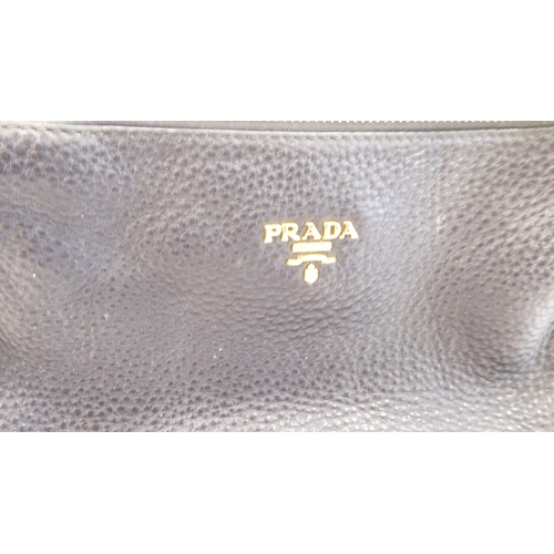 113 - A Prada Borsa in Tessuto Bleu handbag with plastic chain handle; a Prada black jacquard reticule typ... 