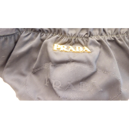 113 - A Prada Borsa in Tessuto Bleu handbag with plastic chain handle; a Prada black jacquard reticule typ... 