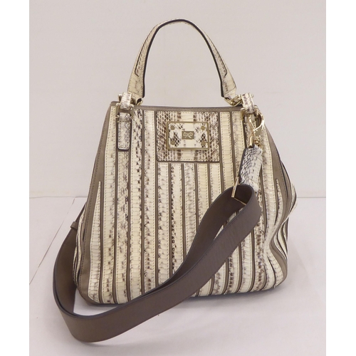 114 - An Anya Hindmarch small Belvedere 'snake' handbag  No. A 113048393 with a dust cover 