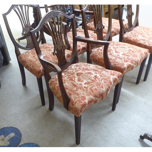 120 - A set of six Hepplewhite design mahogany framed dining chairs, the red floral patterned fabric uphol... 