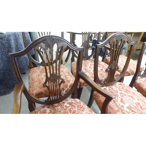 120 - A set of six Hepplewhite design mahogany framed dining chairs, the red floral patterned fabric uphol... 