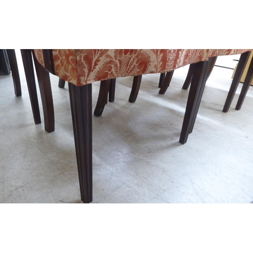 120 - A set of six Hepplewhite design mahogany framed dining chairs, the red floral patterned fabric uphol... 