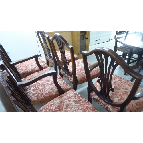 120 - A set of six Hepplewhite design mahogany framed dining chairs, the red floral patterned fabric uphol... 