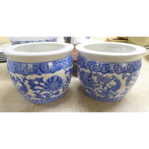 121 - Modern, mainly blue and white Chinese porcelain planters  all approx. 7