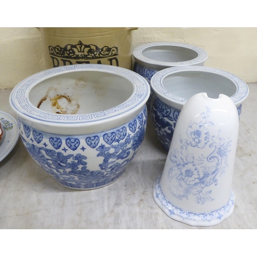 121 - Modern, mainly blue and white Chinese porcelain planters  all approx. 7