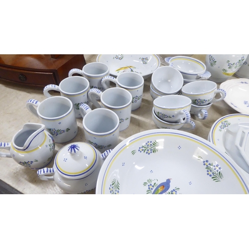 138 - Quimper tableware: to include a teapot, cups and plates