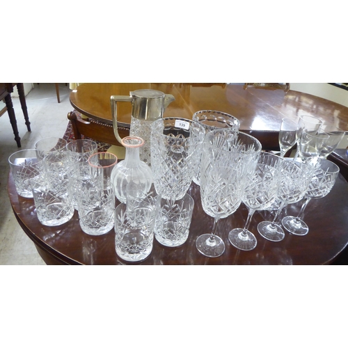 139 - Glassware: to include three similar vases  8