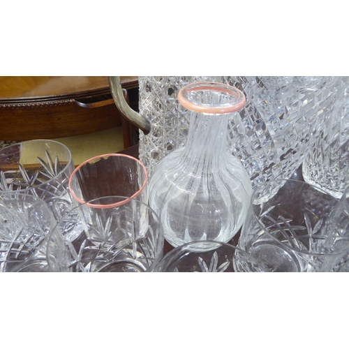 139 - Glassware: to include three similar vases  8