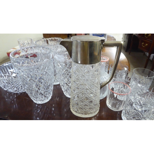 139 - Glassware: to include three similar vases  8