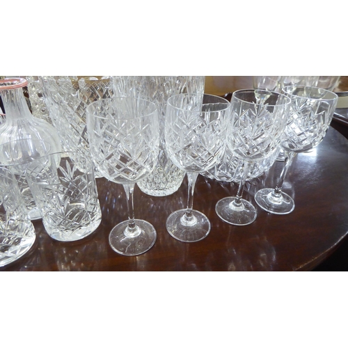 139 - Glassware: to include three similar vases  8