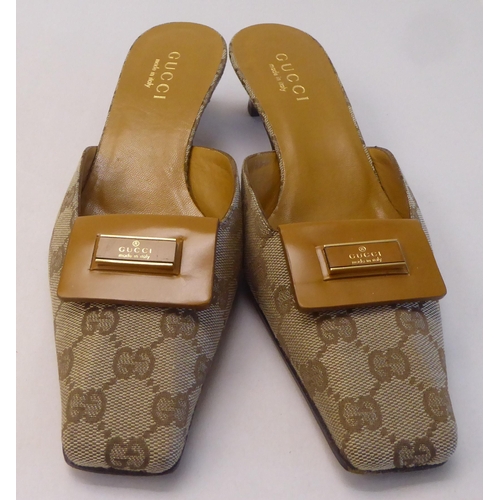 14 - A pair of ladies Gucci tan leather and patterned fabric, low heeled sandals  size 39