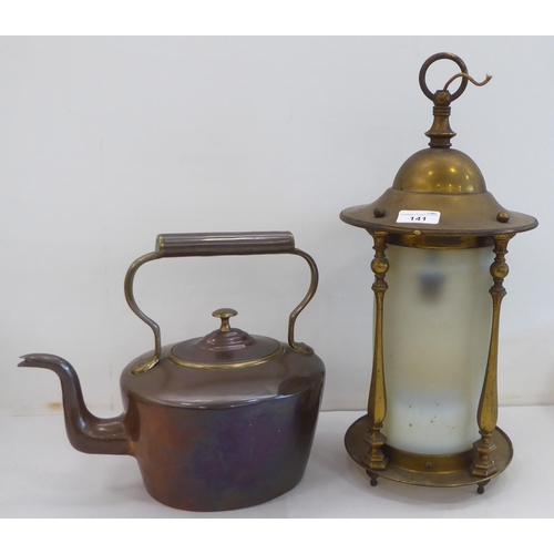 141 - Metalware: to include an Arts & Crafts style lacquered brass lantern with an opaque shade  ... 