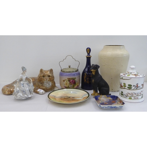 142 - Ceramics: to include a Winstanley pottery model, a Tabby cat  6.5