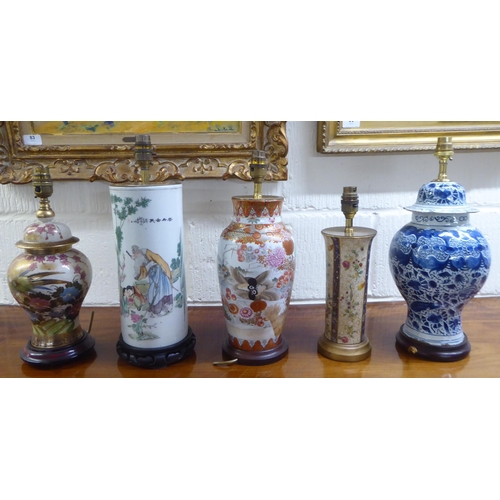 144 - Five dissimilar table lamps: to include a late 19thC Chinese porcelain example, decorated with figur... 