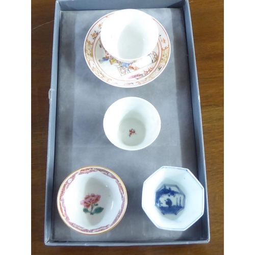 154 - 18thC and later Chinese porcelain items: to include a tea bowl and saucer, decorated with figures in... 