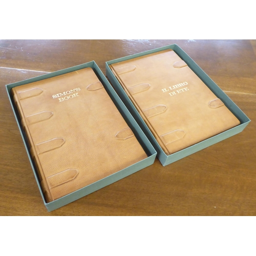 157 - Two unused tan coloured hide bound ledgers  boxed