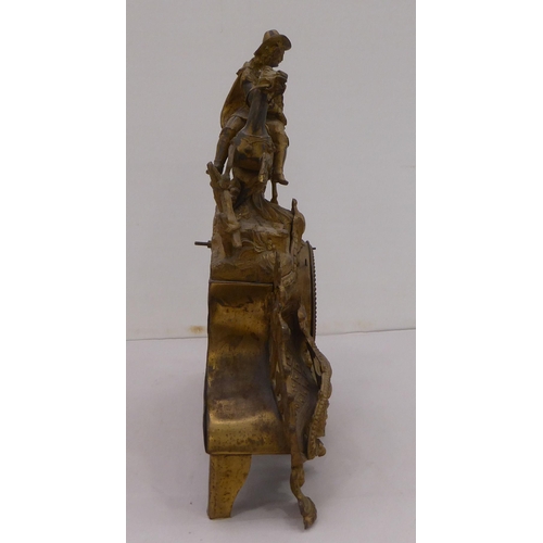 160 - An early/mid 20thC French gilded spelter mantel clock, fashioned as a cavalier on horseback; the mov... 