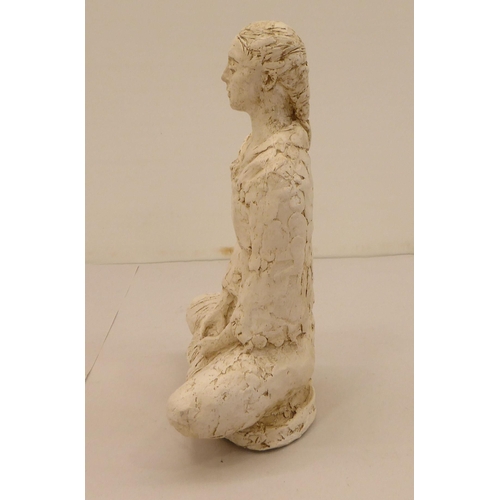 164 - A moulded plaster figure, a woman, seated, cross legged  bears an indistinctly impressed signature &... 