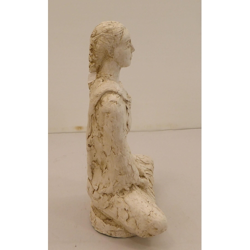 164 - A moulded plaster figure, a woman, seated, cross legged  bears an indistinctly impressed signature &... 