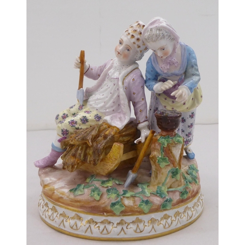 165 - Four items of 20thC Continental porcelain: to include a juvenile group  5