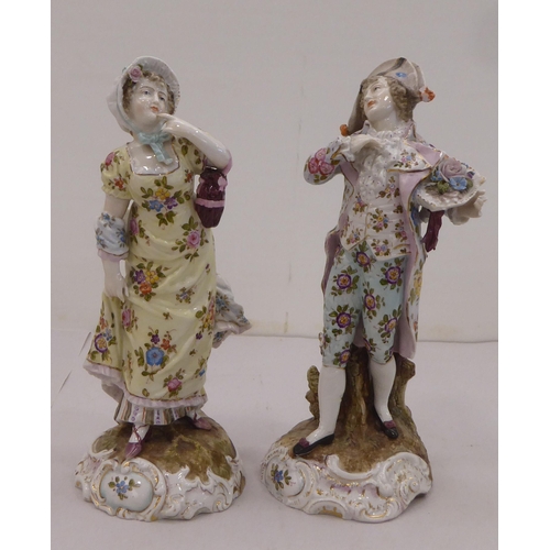 165 - Four items of 20thC Continental porcelain: to include a juvenile group  5