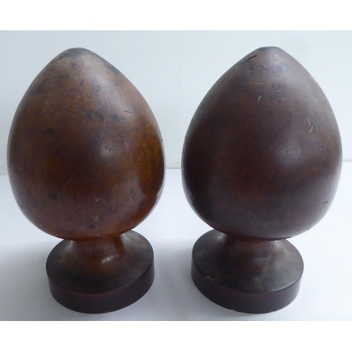 178 - A pair of late 18thC turned mahogany acorn shape post finials  10.5