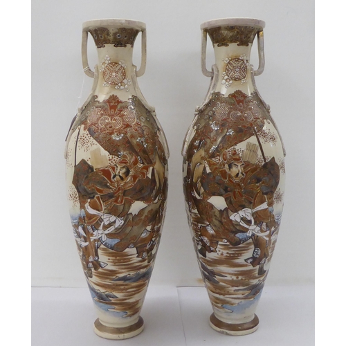 183 - A pair of early 20thC Japanese Satsuma earthenware vases, each decorated with a warrior  18