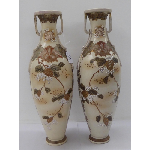 183 - A pair of early 20thC Japanese Satsuma earthenware vases, each decorated with a warrior  18