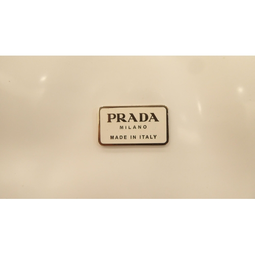 196 - A Prada Bianco Spazzolato & PL handbag with a dust cover  circa 1998 