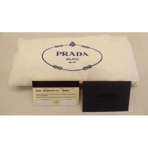 196 - A Prada Bianco Spazzolato & PL handbag with a dust cover  circa 1998 