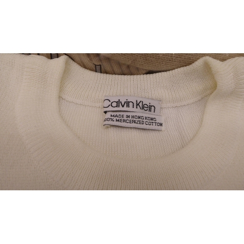 202 - Seven cotton/cashmere jumpers in cream and fawn colours  approx. size 10/12