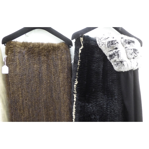 204 - Two fur wraps; and an N Peal black cashmere and fur stole 