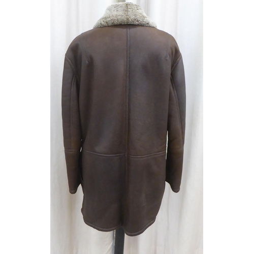 206 - A lady's Gucci brown leather faux fur lined 'car coat'  approx. size 14