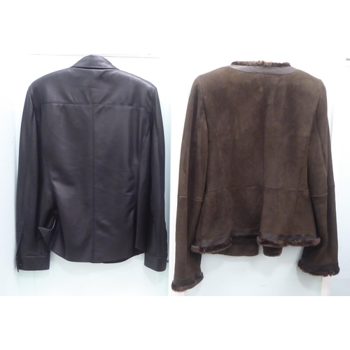 208 - A lady's Jaeger black leather shirt  size 12; and an Armani Collezioni brown suede jacket ... 