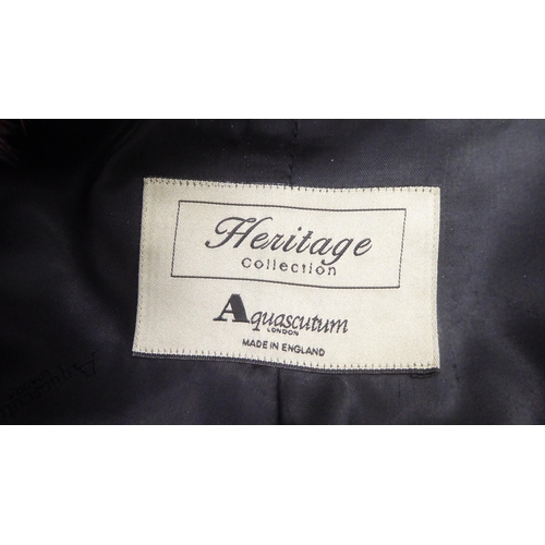 211 - A lady's Aquascutum full length black fabric coat with a mink collar and trim  size 10 