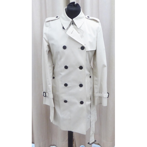 212 - A lady's Aquascutum mid length stone coloured raincoat  size 8