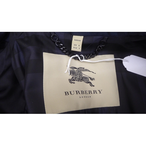 213 - A lady's Burberry 'slim fit' mid length deep blue satin finished coat  size 8