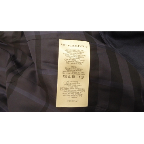 213 - A lady's Burberry 'slim fit' mid length deep blue satin finished coat  size 8