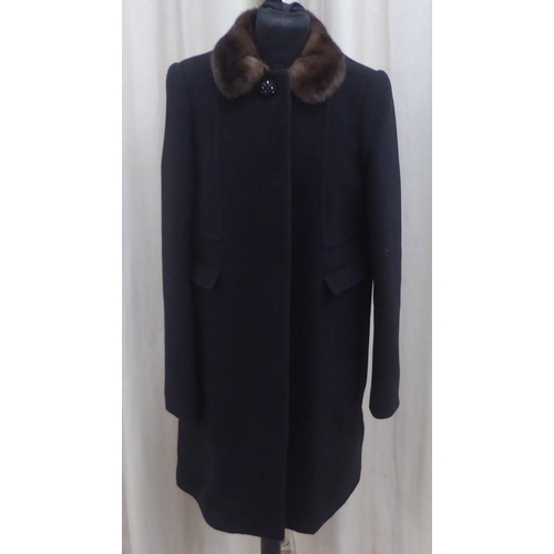 216 - A lady's Dolce & Gabbana mid-length black wool/cashmere coat with a detachable mink collar ... 