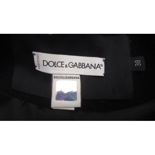 216 - A lady's Dolce & Gabbana mid-length black wool/cashmere coat with a detachable mink collar ... 