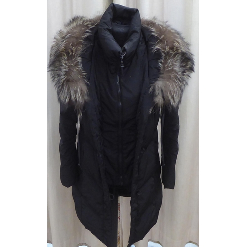 217 - A lady's Ralph Lauren quilted black coat with a faux fur trimmed hood  size 8/10 