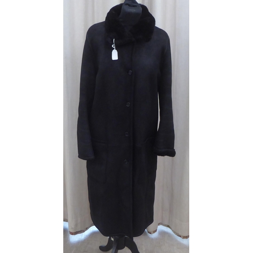 218 - A lady's Giorgio Armani full length black sheepskin coat  size 10  