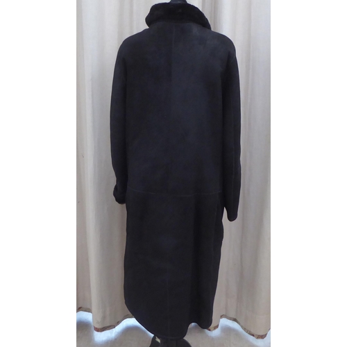 218 - A lady's Giorgio Armani full length black sheepskin coat  size 10  