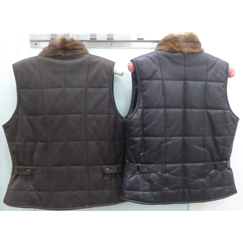 223 - Two ladies Hide Park leather gilet, one in brown, the other black, both with mink collar trim  ... 